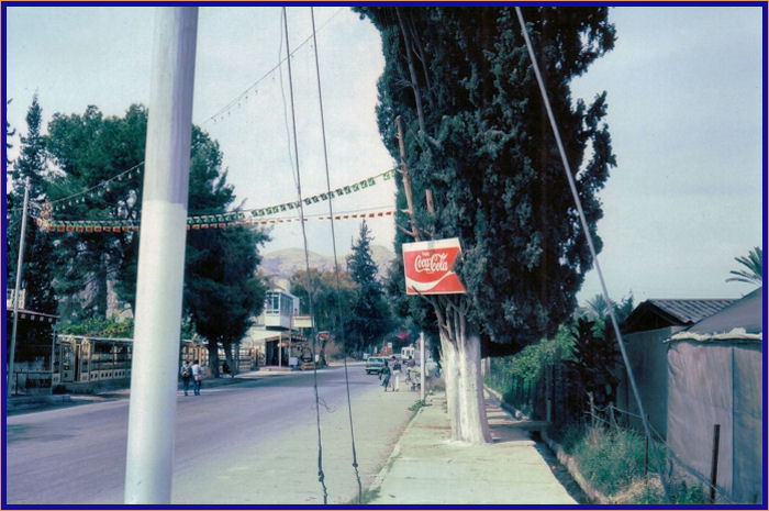 Coca Cola sign on the streets of Jericho